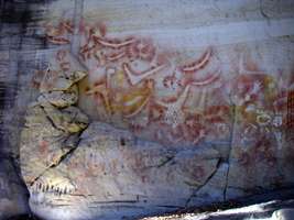 Carnarvon Gorge artwork Art Gallery rock shelter boomerangs returning stone axes vulvas