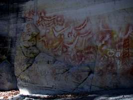 Carnarvon Gorge artwork Art Gallery rock shelter boomerangs returning stone axes vulvas