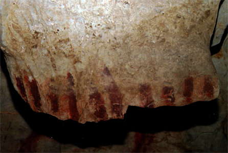 Cueva del Pindal red striped signs