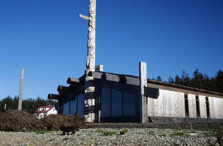 Skidegate totem pole and building