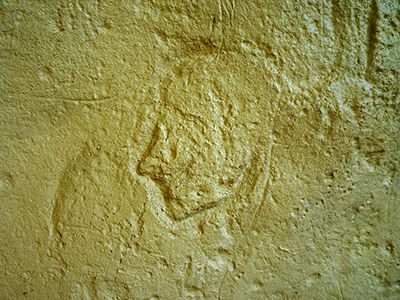 carved stone human profile